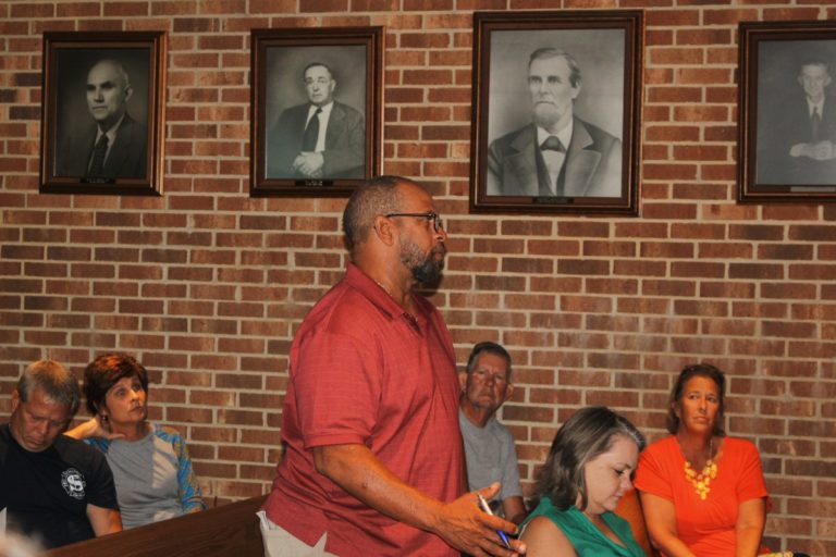 Stoneville citizens at a town meeting